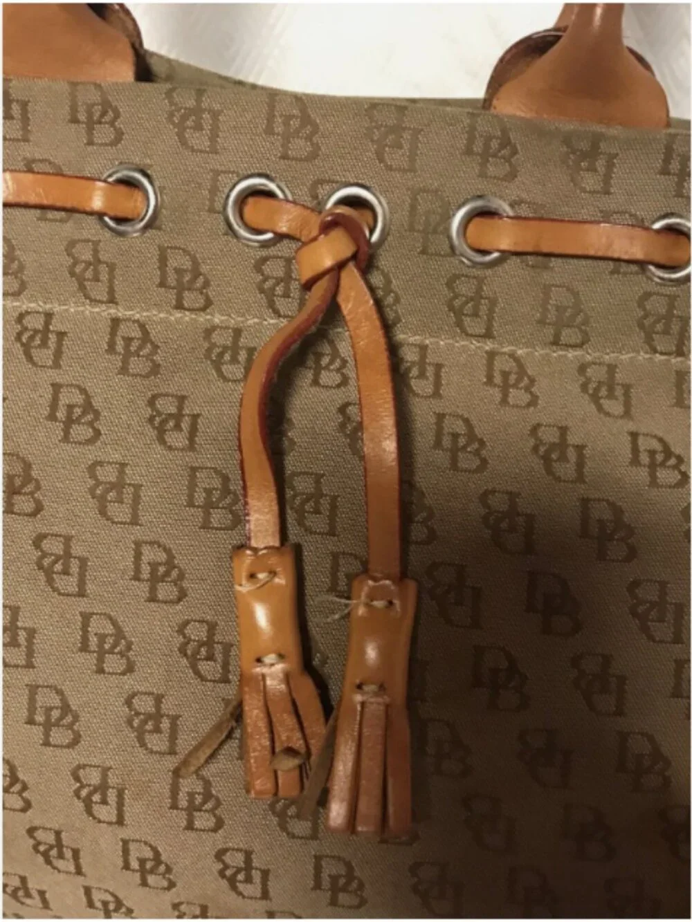 VINTAGE DOONEY AND BOURKE SIGNATURE TASSEL CANVAS LEATHER SHOULDER BAG